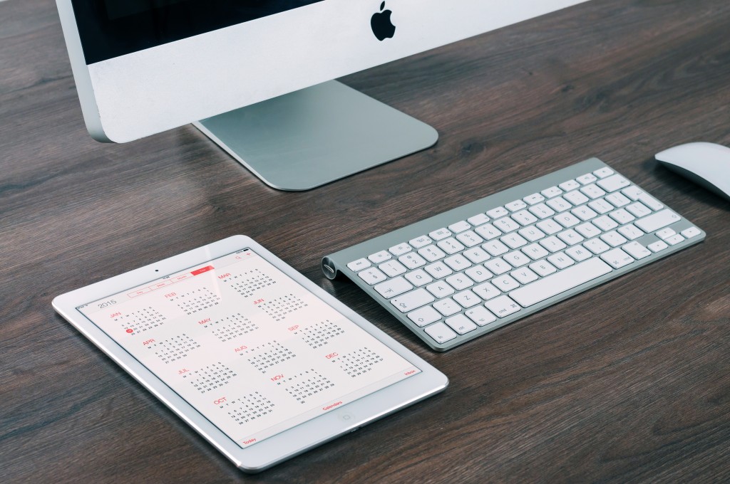 Computer and iPad with calendar